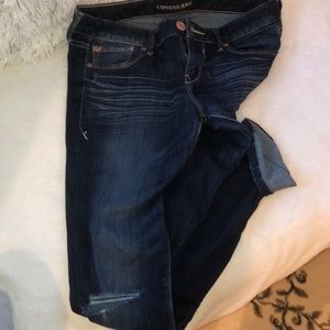 Blue jeans with slit in one knee!